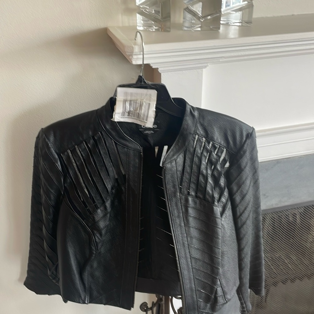 Beautiful cropped Bebe vegan leather jacket